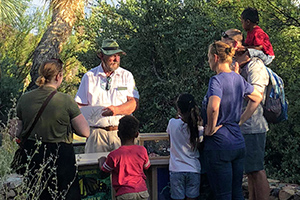 Docent interpreting to family